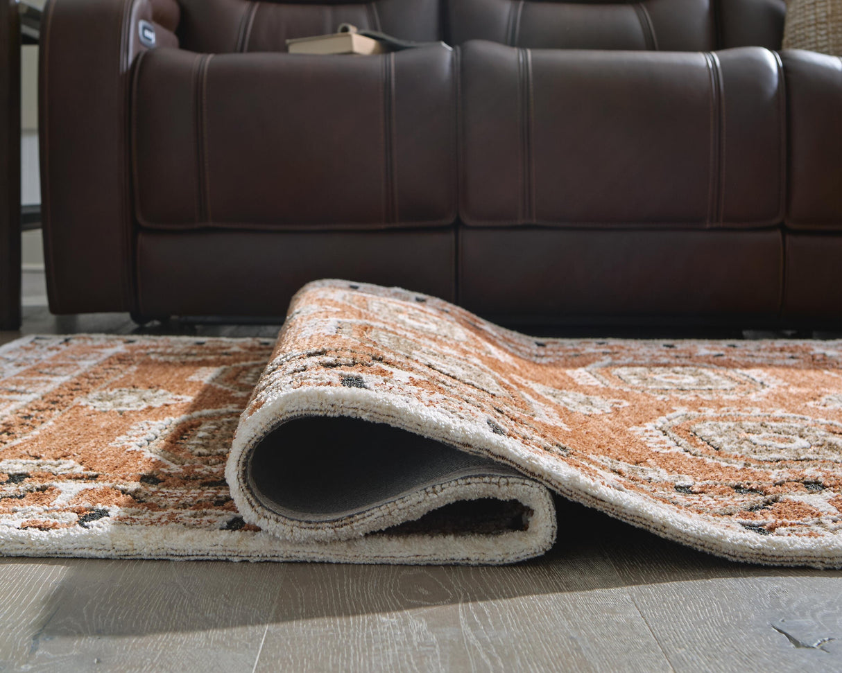 Qaabiz Area Rug