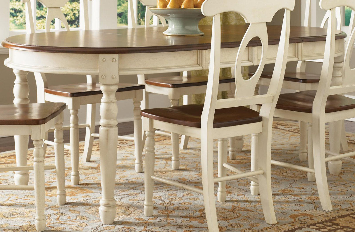 A-America British Isles Oval Leg Dining Table in Merlot/Buttermilk